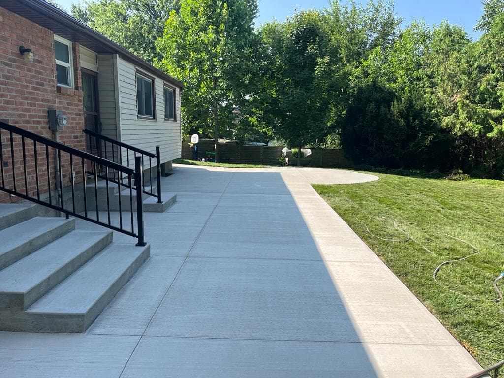 Running bond brick stamped concrete walkway pattern in London, Ontario