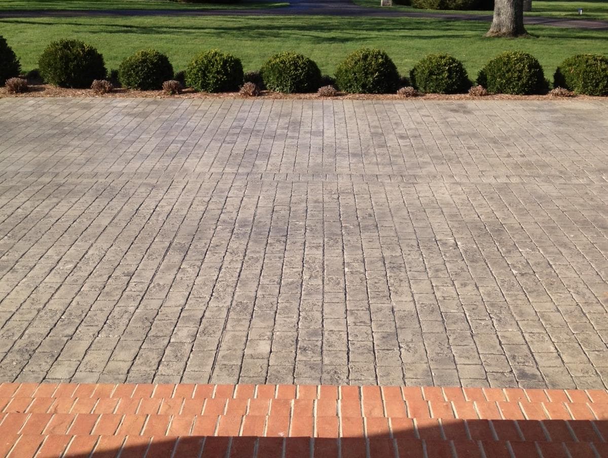 Stamped concrete driveway with decorative pattern in London, Ontario