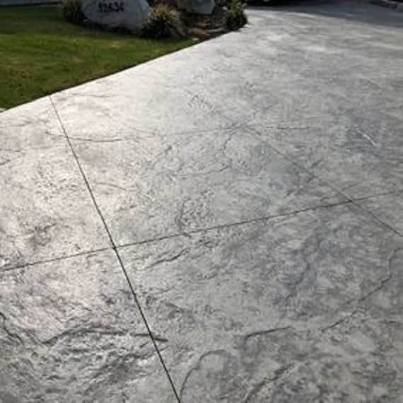 Cobblestone stamped concrete driveway pattern installed in London, Ontario